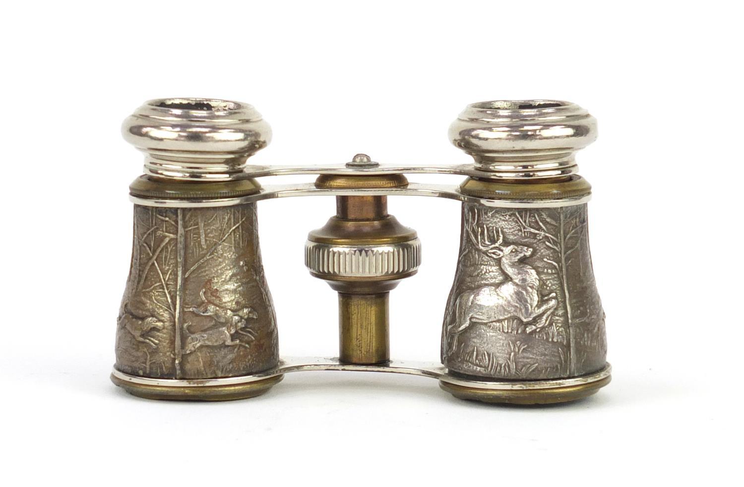 Pair of opera glasses, the barrels decorated with stags and hounds, housed in a velvet lined - Image 3 of 8