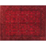 Rectangular Afghan red ground carpet, 202cm x 152cm :For Further Condition Reports Please Visit