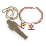 Egyptian ushabti together with a scarab beetle necklace and beadwork necklace, the ushabti 19cm high