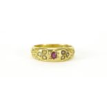 Victorian 18ct gold ruby and seed pearl ring with scroll shoulders, Birmingham 1898, size M, 4.4g :