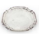 Square silver four footed tray with shaped edge, by A Haviland-Nye London 1973, 34.5cm x 34.5cm,