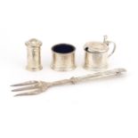 Silver three piece cruet and a fish slice with silver handle, the cruet with blue glass liners,