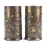 Pair of Japanese Meiji period bronze vases, each decorated with birds amongst blossoming trees,