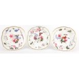 Three 18th century porcelain plates hand painted with flowers, probably Daniel painted by William