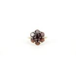 9ct gold garnet flower head ring, size L, 4.0g :For Further Condition Reports Please Visit Our