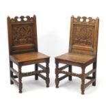 Pair of mid 19th oak chairs with carved panel backs, 102cm high : For Further Condition Reports or