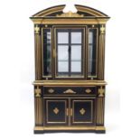 Italian style black and gold painted dresser with bevelled glass door, above a single drawer and