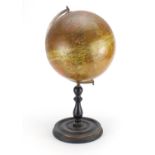 Geographia 10 inch terrestrial globe raised on an ebonised stand, 48cm high :For Further Condition
