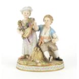 19th century Meissen figure group of a boy and girl playing a mandolin, blue cross sword marks and