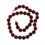 Cherry amber coloured bead necklace, 48cm in length, 55.3g :For Further Condition Reports Please