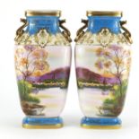 Pair of Noritake vases with ring turned handles, each hand painted with landscapes, 31cm high :For