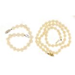 Single string pearl necklace with 9ct gold clasp and a pearl bracelet with a silver clasp, the