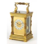 Large French gilt brass cased repeating carriage clock striking on a gong, the enamelled chapter