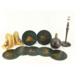 Chinese chinoiserie lacquer including two lamps, pair of bookends and seven place mats, the