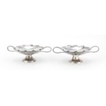 Pair of Chinese silver sweetmeat dishes with twin handles by Wang Hing, each engraved with a bird