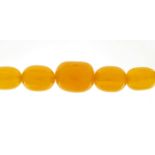 Amber coloured bead necklace, 60cm in length, 132.6g :For Further Condition Reports Please Visit Our