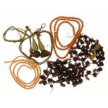 Two Victorian garnet and gold braid necklaces and two coral necklaces :For Further Condition Reports