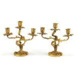 Pair of 19th century French Louis XV ormolu three branch candelabras, each 25cm high :For Further
