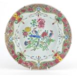 Chinese porcelain basin finely hand painted in the famille rose palette with birds of paradise