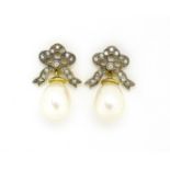 Pair of antique style 9ct gold cultured pearl and diamond bow design earrings, 2cm in length, 4.