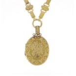Victorian aesthetic unmarked gold locket on a matching necklace, the locket 6.5cm in length, the