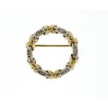 9ct two tone gold diamond wreath brooch, 2cm in diameter, 3.0g :For Further Condition Reports Please