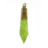 Green jade pendant with unmarked gold mount, decorated with a horse shoe, 4.5cm in length, 3.0g :For