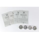 Four United States of America silver Luna eagle dollars, with certificates comprising dates 2001,