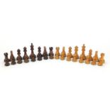 Carved and turned wooden chess set with beize lined sectional case, the largest piece 10cm high :For