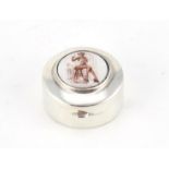 Sterling silver pill box with enamelled risqué female panel, 2.5cm in diameter, 10.4g :For Further