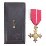 Silver gilt OBE housed in a fitted silk and velvet lined leather case :For Further Condition Reports