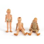 Three miniature German bisque dolls house dolls with jointed limbs, each 9.5cm high :For Further