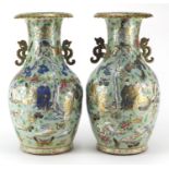 Large pair of Chinese celadon glazed baluster vases with twin handles, each hand painted and