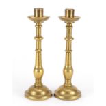 Pair of antique continental bronze candlesticks, each 31.5cm high :For Further Condition Reports