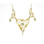 Art Nouveau 9ct gold peridot and pearl necklace, 40cm in length, 4.8g :For Further Condition Reports