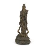 Chinese bronze figure of Guanyin standing on a toad and lotus leaf, 33cm high :For Further Condition