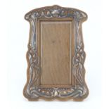 Art Nouveau silver and oak easel photo frame with bevelled glass, by William Hair Haseler,