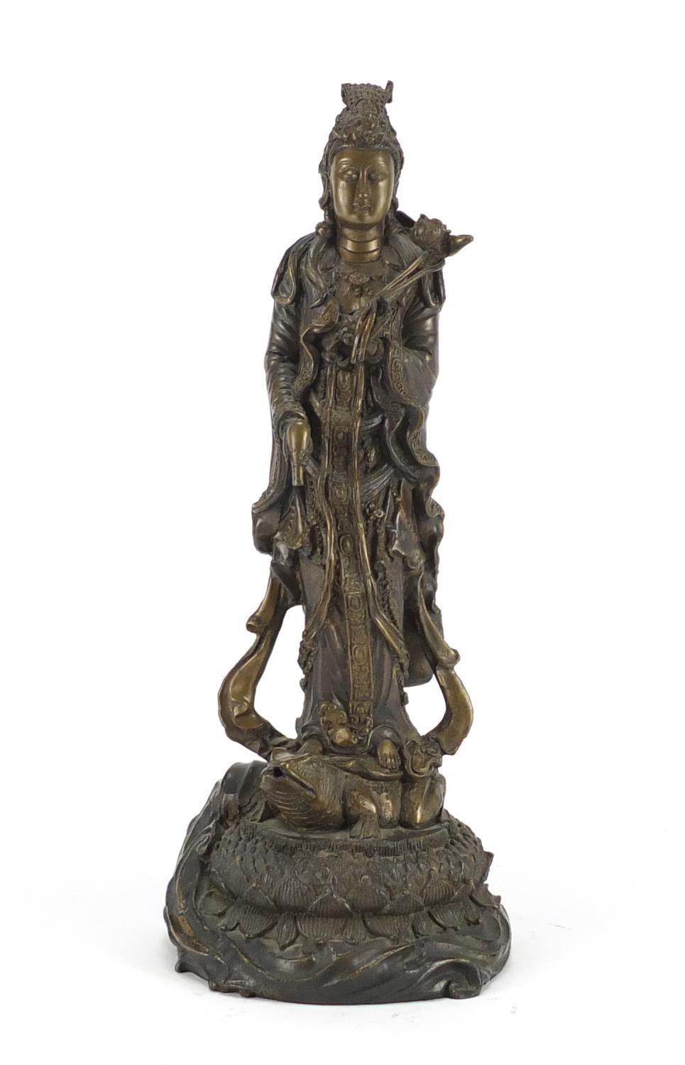 Chinese bronze figure of Guanyin standing on a toad and lotus leaf, 33cm high :For Further Condition - Image 2 of 6