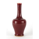 Chinese porcelain Sang De Boeuf glazed vase, six figure character marks to the base, 27cm high :