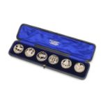 Set of six Victorian Scottish silver buttons housed in a Mackay & Chisholm fitted case, embossed and