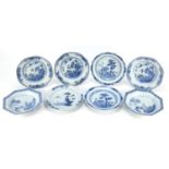 Eight Chinese blue and white porcelain plates and bowls, hand painted with landscapes and flowers,