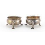 Pair of Edwardian silver open salts, raised on three hoof feet, indistinct makers mark Chester 1910,