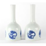 Pair of Chinese blue and white mallet vases, hand painted with roundels of phoenixes and dragons,