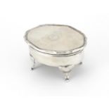Oval silver four footed jewel box with hinged lid and lined interior, mark 830, 10.5cm in length,