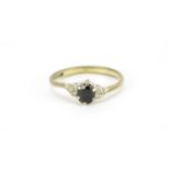 9ct gold sapphire and clear stone ring, size K, 1.4g :For Further Condition Reports Please Visit Our