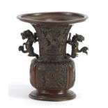 Chinese bronze vase with Dog-of-Foo handles, cast in relief with figures and landscapes, 15cm