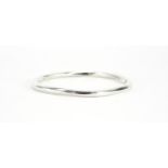 Tiffany & Co sterling silver 1997 bangle, 7.2cm in diameter, 30.8g :For Further Condition Reports