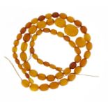 Butterscotch amber coloured bead necklace and beads, 53.0g :For Further Condition Reports Please