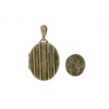 Victorian aesthetic silver locket and an Intaglio bust, the locket 5,5cm in length, 13.8g :For