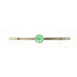 9ct gold cabochon green stone bar brooch, housed in a T R Whibley leather box, 6.5cm in length, 2.9g